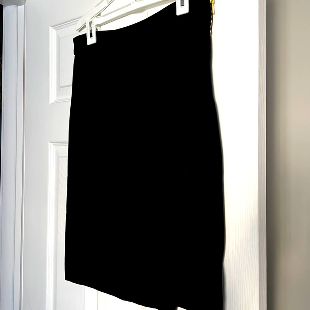 The perfect little black skirt.  24” long